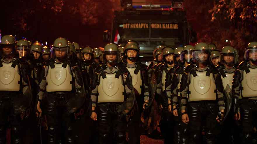 Indonesian police, military personnel and armoured vehicles deployed in Jakarta ahead of student demonstrations.