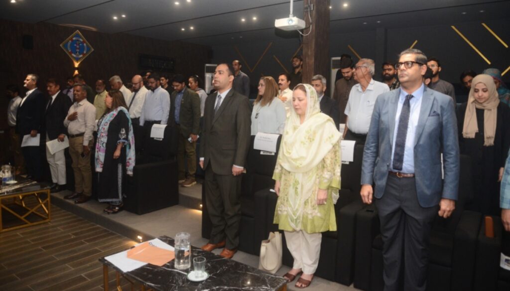 Speakers and participants attend the World Maritime Day 2026 seminar in Karachi.