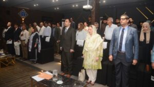 Speakers and participants attend the World Maritime Day 2026 seminar in Karachi.