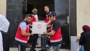 SKT Welfare humanitarian delegation supporting displaced Palestinians during a mission in Jordan.