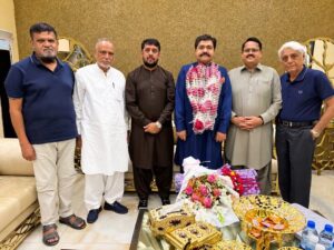 - Sardar Shahid Laghari with senior members congratulating him on his POEPA CEC election victory.