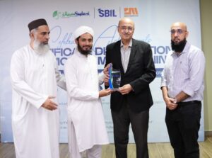 SBIL certificate distribution ceremony at Ibn-e-Adam IT Park in Karachi with students and distinguished guests.