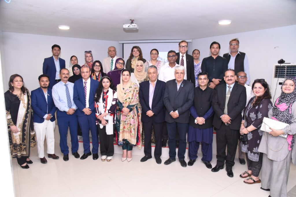 Speakers and participants at the FPCCI seminar on artificial intelligence and corporate business growth in Karachi.