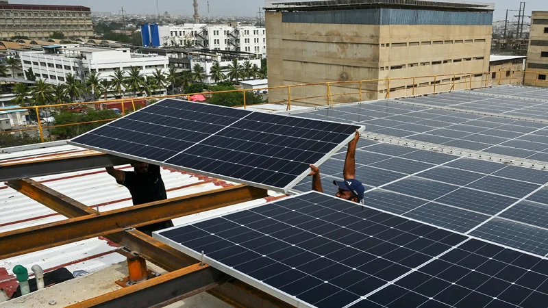 - Solar panels in a large-scale solar installation amid proposed Chinese export controls on manufacturing technology.