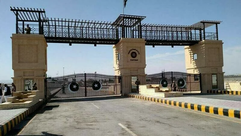 - Freight trucks at a Pakistan-Iran border crossing amid a reported suspension of commercial trade.