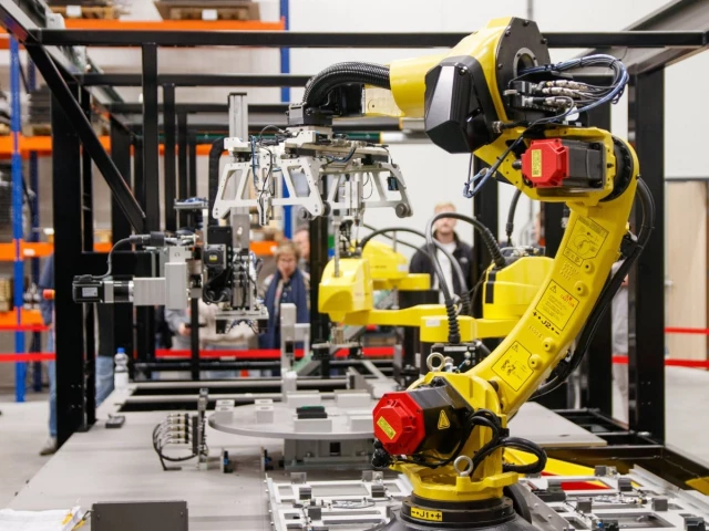Industrial robots operating on a modern factory production line.